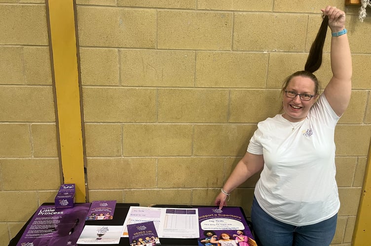 Kay fundraising and sharing information about the wig making chairty