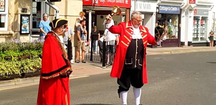 Wellington town crier Andrew Norris reads the VJ Day proclamation accompanied by the mayor Cllr Janet Lloyd.