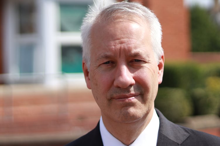 A call has been issued by Taunton and Wellington's MP Gideon Amos for action to crack down on identity theft after a constituent faced bills totalling more than £45,000.
