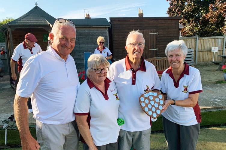 Left to right: Cliff Trott, Janet Lovell and Arther Carter with Diana Dagg presenting the winning shield