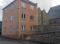 Police find man dead in town centre flat
