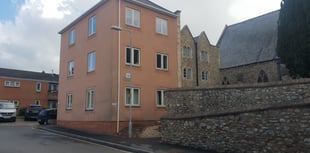 Police find man dead in town centre flat