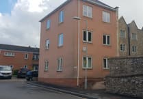 Unexplained death of man found after police remove door to Wellington flat