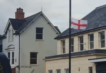 National flags appear on lampposts from one end of Wellington to the other