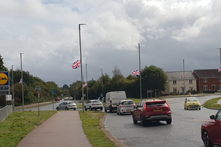 Union flags fluttering on lampposts around the Cades roundabout on the approach to Wellington.