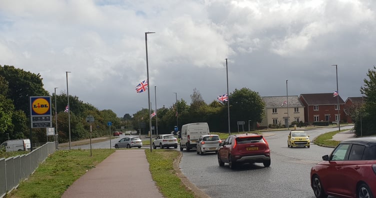 Union flags fluttering on lampposts around the Cades roundabout on the approach to Wellington.