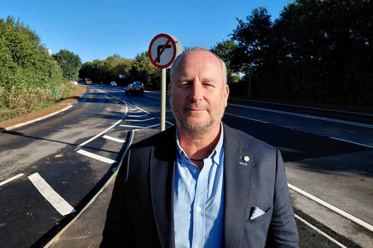 Somerset Cllr Mike Rigby outside Foxmoor Business Park on the newly-rebuilt Chelston link road.