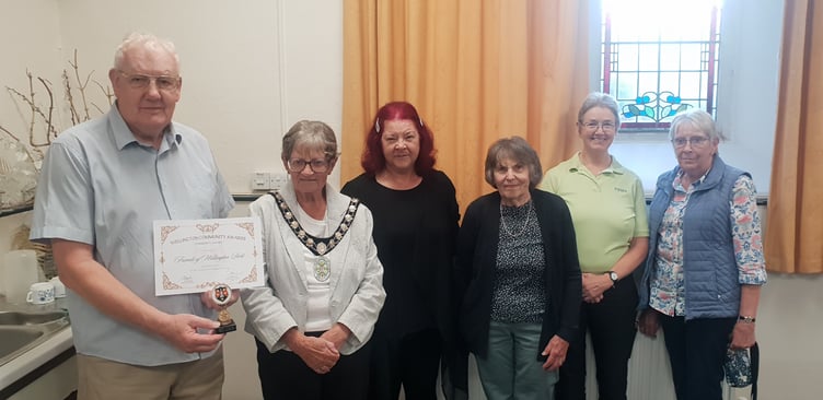Friends of Wellington Park chairman Roger Nunn and other volunteers received Wellington Town Council's community award from mayor Cllr Janet Lloyd.