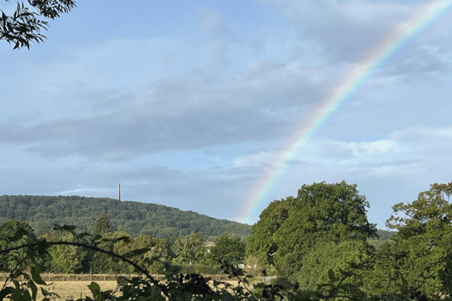 Rainbow alongside Wellington Monument on Blackdown Hills above the town taken as the autumnal weather arrived last week