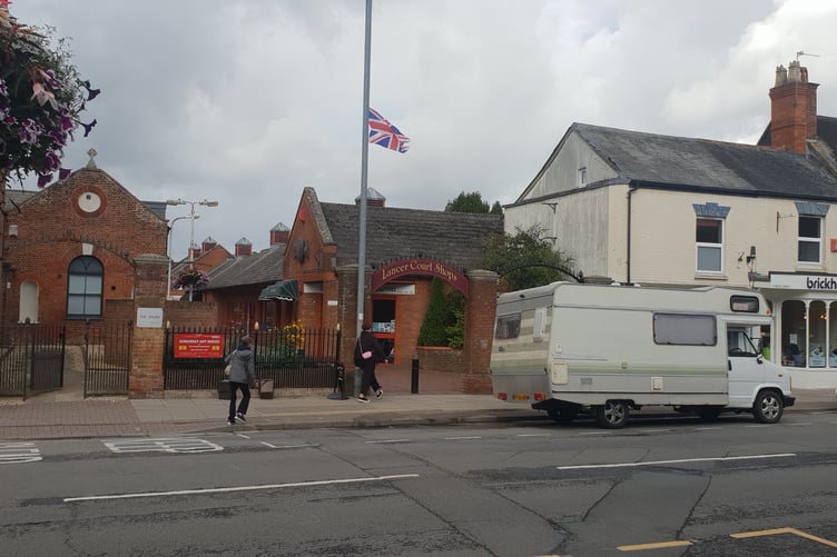 Councillors in Wellington are to discuss issuing a 'position statement' on the raising of flags such as this one in High Street at the entrance to Lancer Court.