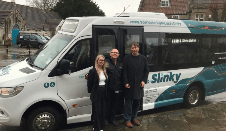Somerset executive Cllr Richard Wilkins (right) with the 'Digital Slinky' bus service.