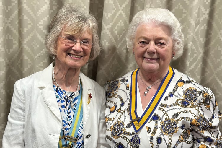Inner Wheel district chairman Fran Allen presented Wellington Inner Wheel Club president Rosemary Wharton with a 50th anniversary collar