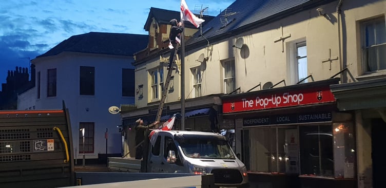 'Raise the Colours' activists replace flags in Wellington town centre which had been taken down by a vigilante at the weekend.