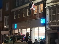 Tension rising as flags raised again in town centre