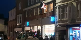 Tension rising as flags raised again in town centre