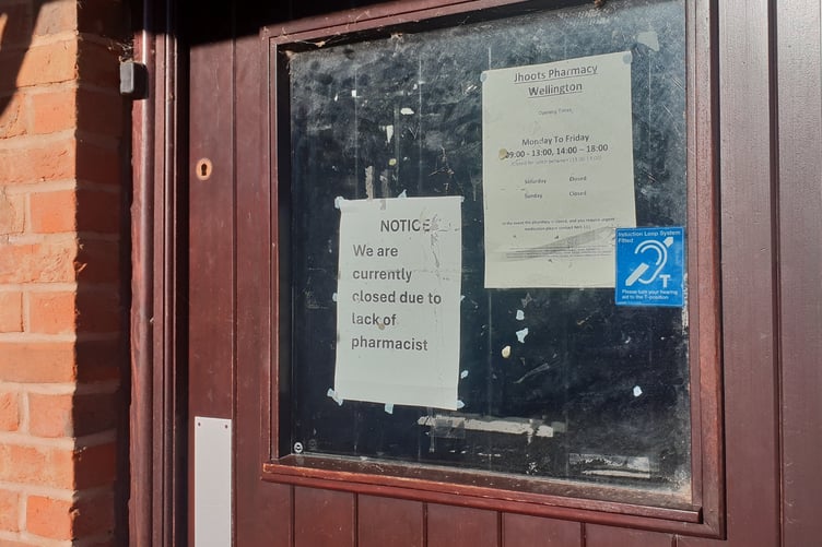 The Wellington branch of Jhoots pharmacy company has a 'closed' notice on its front door.