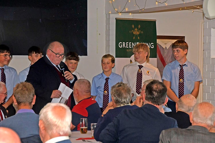 Wiveliscombe Rugby Club's chairman Gary Sharland with youngsters who acted as waiters at the Past Players lunch last Saturday. 