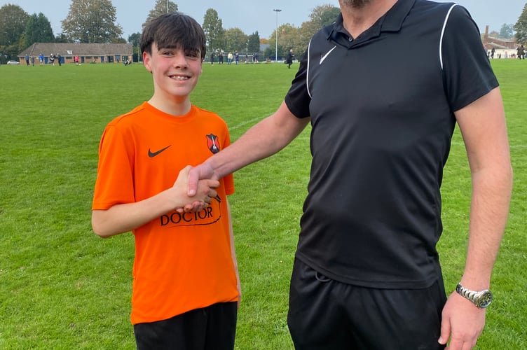 Wellington's Player of the Match Fletcher L with Geoff Mold, Wellington Town's U15 coach 