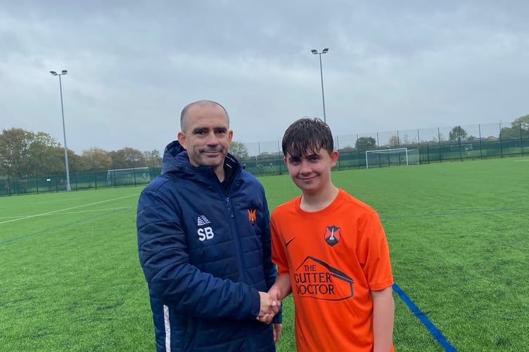 Wellington U15 coach Scott Bates with Matthew T Player of the Match