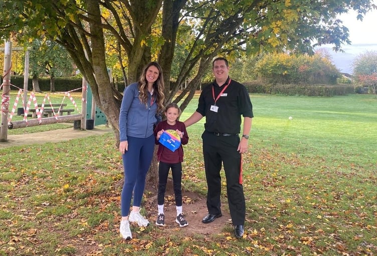 Jazz Carlin with competition winner Nancy and Gary Beasley Everyone Active's general manager.