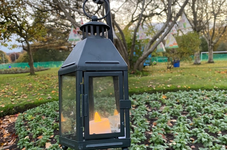 Lanterns featured in the garden alongside art pieces depicting flowers, the Earth, the moon, and native species. 