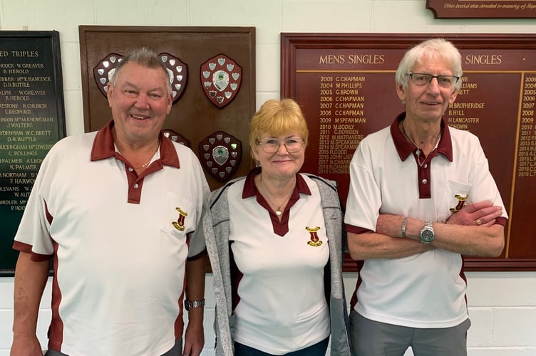 Left to right: Tony Gibson, Liz May (marker), and Alan May