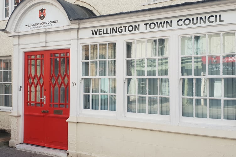 Wellington Town Council's considering employing its own planning officer to help cope with massive new house building.