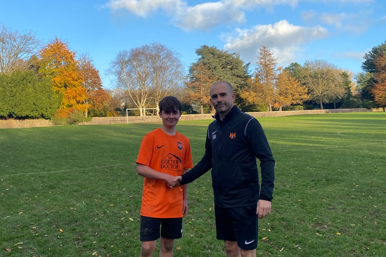 Player of the Match Matt T with coach Scott Bates