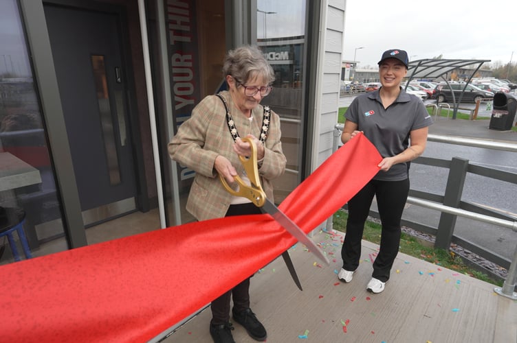 Wellington Mayor Janet Lloyd carried out the ribbon cut as Domino's Pizza opened their pod in Westpark 26 Business Park.