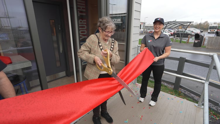 Wellington Mayor Janet Lloyd carried out the ribbon cut as Domino's Pizza opened their pod in Westpark 26 Business Park.