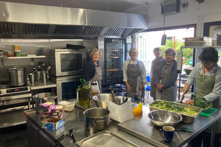 Some of the Wivey Kitchen charity chefs in the kitchen provided by the Bear Inn, Wiveliscombe.