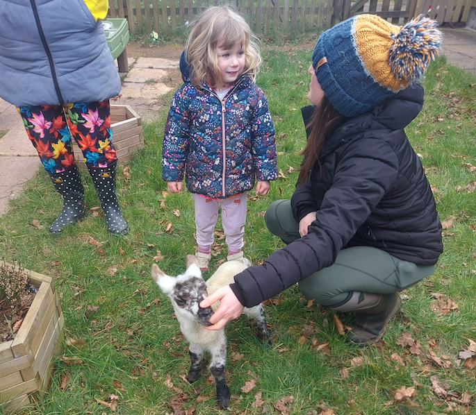 Stawley Pre-school children enjoy local farmers bringing their animals to visit.