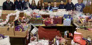 Pupils deliver 50 Christmas hampers to local families