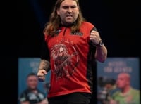 Searle through to second round of World Darts Championship 