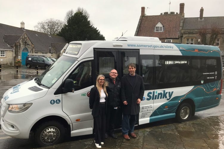 Somerset Cllr Richard Wilkins (right) with one of the digital Slinky buses.