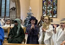 Primary school pupils bring Christmas joy to St John the Baptist Church