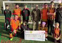 Rotarians hand over £250 cheque to Ability Counts section