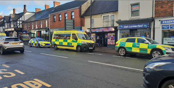 Ambulance and police vehicles can be seen in Wellington's High Street as a tragedy unfolded in front of Christmas shoppers and carollers.