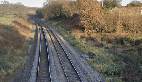 Man stood on track before train struck him
