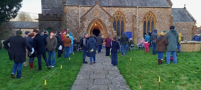 The churchyard was filled with about a hundred people for the crib and carol service.