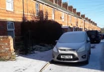 Icy conditions halt school and buses