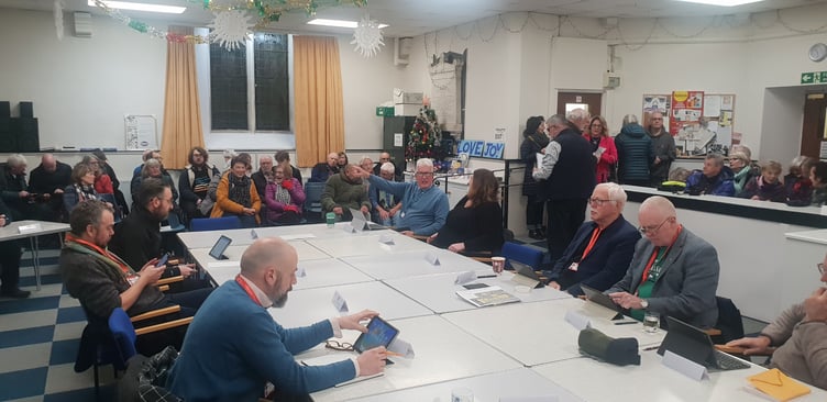 Residents arriving for a Wellington Town Council meeting to discuss a Pegasus Group planning application.
