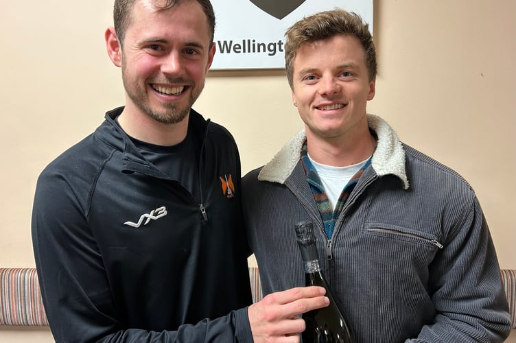 Glen Wright (left), scorer of Wellington's late winner, was Player of the Match and he received his award from sponsor and Australian visitor Dave Grose.