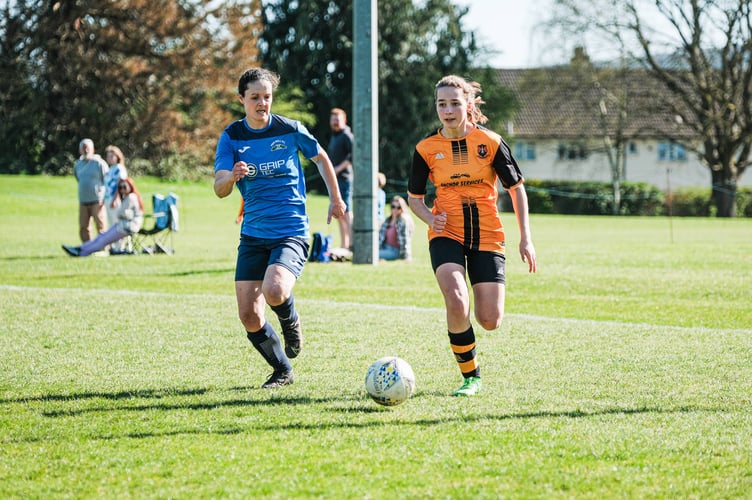 Wildcats’ scorer Milly Howe (tangerine) 