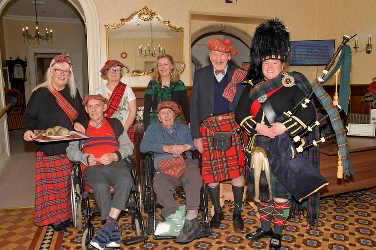 Ready for Nynehead Court's Burns lunch are (left to right) Helen Hill, Jenny Horton, Sarah Thurston, David Simons, Francis Cavill, John Hill, and piper Jen Botterill.