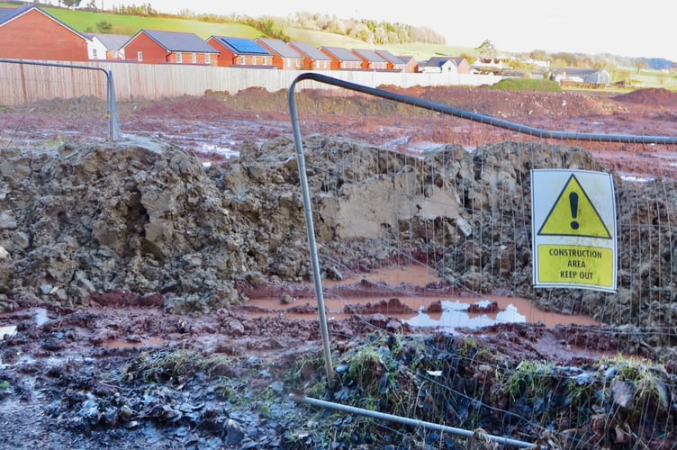 Views over the Sandys Moor site where earth and construction waste has been dumped.