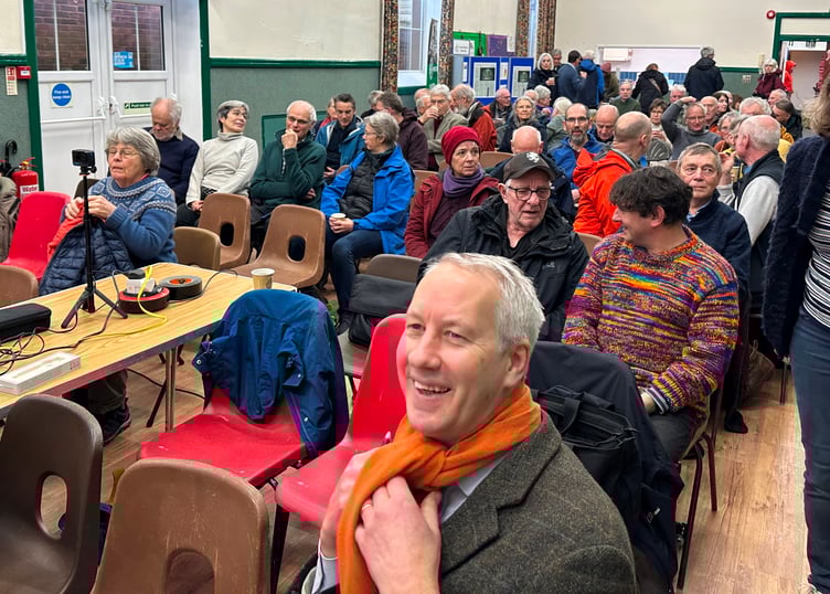 Wellington's MP Gideon Amos at the front of the audience attending the first public presentation for the town's greenway project.