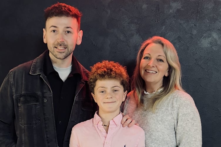 Wellington School's director of drama, Claire Davies, choreographer Dean Brammall and Will.