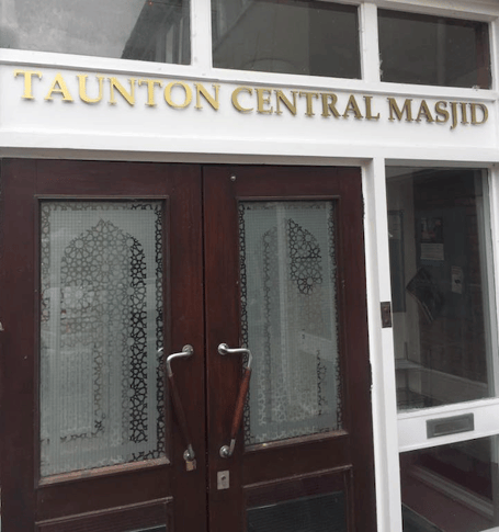 A Wellington man is one of two people accused of smashing a window of a mosque in Taunton.