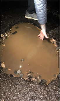 Pothole or Lunar crater? Gerbestone Lane, just outside of Wellington.